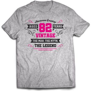 82 Jaar Legend - Feest kado T-Shirt Heren / Dames - Antraciet Grijs / Roze - Perfect Verjaardag Cadeau Shirt - grappige Spreuken, Zinnen en Teksten. Maat XXL