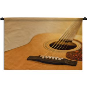 Wandkleed Akoestische gitaar - Schuine kijk op een akoestische gitaar Wandkleed katoen 90x60 cm - Wandtapijt met foto