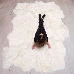 Designer schapenvacht vloerkleed 300 x 200 cm patchwork Ivoor wit; Creme wit | Hoogpolig vloerkleed natuurlijke vorm..