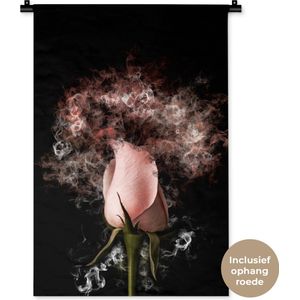 Wandkleed BloemenKerst illustraties - Roze bloem met abstracte rook tegen zwarte achtergrond Wandkleed katoen 60x90 cm - Wandtapijt met foto