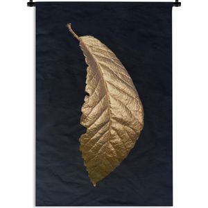 Wandkleed Golden leaves staand - Krom blad van goud op een zwarte achtergrond Wandkleed katoen 60x90 cm - Wandtapijt met foto