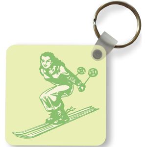 Sleutelhanger - Uitdeelcadeautjes - Een skiër maakt snelheid met zijn stokken in een illustratie - Plastic