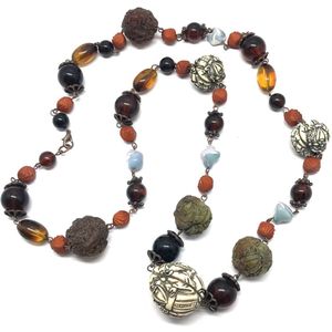 Behave Ketting - lange ketting - kralenketting - bruin - buddha kralen - boeddha motief - 90cm
