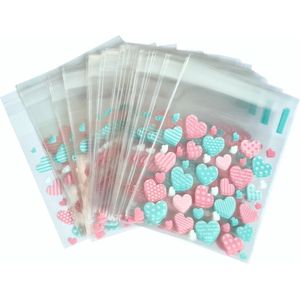 Fako Bijoux® - Cellofaan Zakjes - 100x Uitdeelzakjes - Cellofaan Plastic Traktatie Kado Zakjes - Snoepzakjes - Hartjes Roze/Groen - 7x7cm