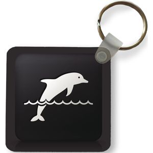 Sleutelhanger - Uitdeelcadeautjes - Een illustratie van een dolfijn op een zwarte achtergrond - Plastic