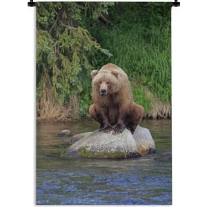 Wandkleed Roofdieren - Grizzly beer op een steen Wandkleed katoen 60x90 cm - Wandtapijt met foto
