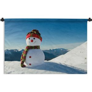 Wandkleed Kerst - Een kerstpop in het besneeuwde landschap tijdens de winter Wandkleed katoen 180x120 cm - Wandtapijt met foto XXL / Groot formaat!