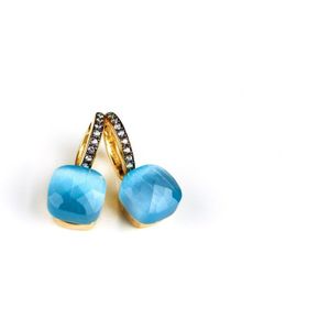 Zilveren oorringen oorbellen geelgoud verguld model pomellato gezet met blauwe steen