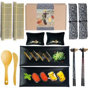 Sushi set compleet 14 delig - 2x sushi eetstokjes, 2x eetstokjes pads, 2x servies zakjes, 2x sauskommen, 2x borden, 2x bamboe sushi mat, 1x paddy paddle, 1x rijst shaker
