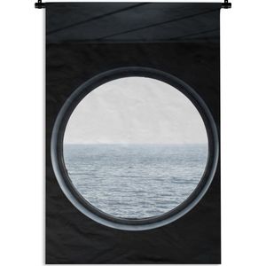 Wandkleed Uitzicht - Uitzicht op de zee door een rond raam Wandkleed katoen 60x90 cm - Wandtapijt met foto