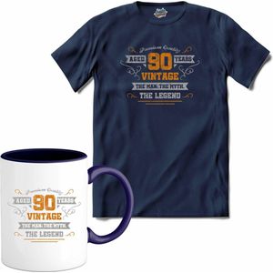 90 Jaar vintage legend - Verjaardag cadeau - Kado tip - T-Shirt met mok - Meisjes - Navy Blue - Maat 12 jaar