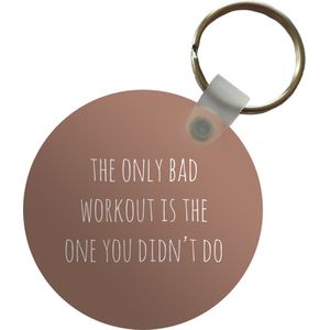 Sleutelhanger - Engelse quote The only bad workout is the one you didn't do tegen een bruine achtergrond - Plastic - Rond - Uitdeelcadeautjes