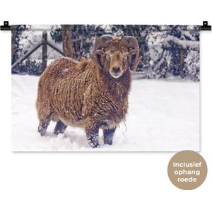 Wandkleed Schaap - Bruine ram in de sneeuw Wandkleed katoen 60x40 cm - Wandtapijt met foto