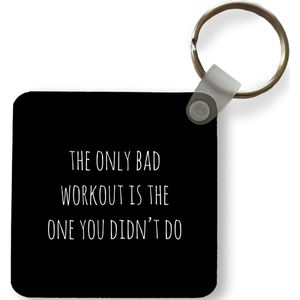 Sleutelhanger - Uitdeelcadeautjes - Engelse quote The only bad workout is the one you didn't do op een zwarte achtergrond - Plastic