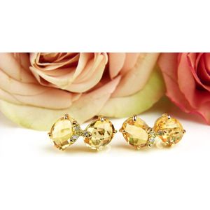 Oorringen in geel goud gezet met citrien en diamant