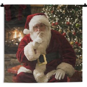 Wandkleed Kerst - De kerstman met op de achtergrond een kleurrijke kerstboom Wandkleed katoen 150x150 cm - Wandtapijt met foto