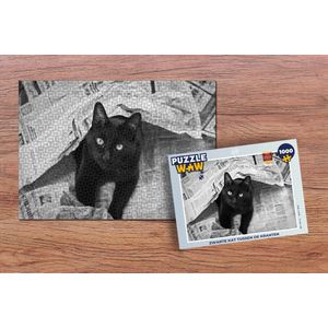 Puzzel Zwarte kat tussen de kranten - Legpuzzel - Puzzel 1000 stukjes volwassenen