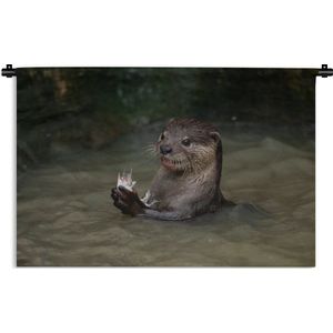 Wandkleed Junglebewoners - Otter met voedsel in het water Wandkleed katoen 150x100 cm - Wandtapijt met foto