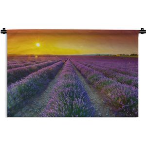Wandkleed De lavendel - Oranje zonsondergang boven veld gevuld met lavendel Wandkleed katoen 120x80 cm - Wandtapijt met foto