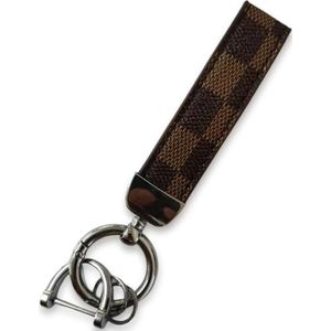 Luxe Sleutelhanger - Bruin Patroon met Zilveren Hanger - Dames & Heren Designer Sleutel Hanger - Keychain Mode Cadeau - Fashion Auto Accessoires