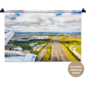 Wandkleed Landschappen Nederland - Zonnige luchtfoto van Amsterdam Wandkleed katoen 60x40 cm - Wandtapijt met foto
