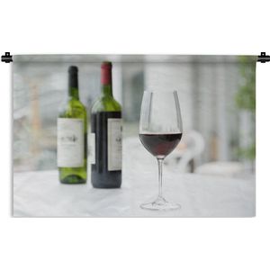 Wandkleed Rode wijn - Twee flessen rode wijn en een glas rode wijn Wandkleed katoen 60x40 cm - Wandtapijt met foto