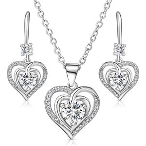 Juwelium Hart in Hart Ketting en Oorbellen Set Crystal White Verstelbaar 41 tot 5 cm Inclusief Witte Luxe Vlinderdoos met 16 Kunstrozen
