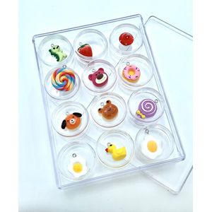 Have' em all: 12 cute Toy Charms in a box, starring dino, duck. Beer, dog, frog, donut, strawberry, lollipop rainbow,lollipop purple, sunny side up egg small, Sunny side up egg medium, mushroom