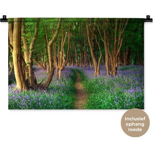 Wandkleed Bospaden - Een bos met gekleurde bloemen Wandkleed katoen 60x40 cm - Wandtapijt met foto