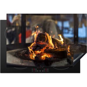 KitchenYeah® Inductie beschermer 78x52 cm - Een brandende open haard - Kookplaataccessoires - Afdekplaat voor kookplaat - Inductiebeschermer - Inductiemat - Inductieplaat mat