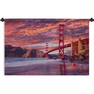Wandkleed Golden Gate Bridge - De Golden gate bridge met een mooie paarse lucht Wandkleed katoen 60x40 cm - Wandtapijt met foto