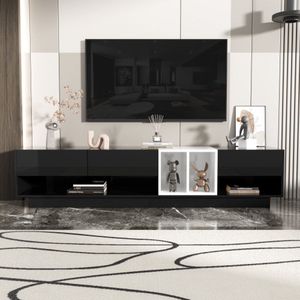 TV-meubel, laag paneel, hoogglans zwart-wit combinatie. Ontwerp met kleurblokken, laden, compartimenten en meerdere opbergruimtes.