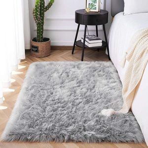 Imitatie schapenvacht tapijt - zachte pluizige stoelbekleding - grijs - wasbaar - 75 x 120 cm vloerkleed
