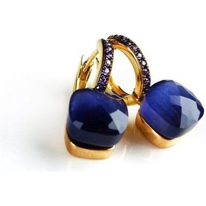 Zilveren oorringen oorbellen geelgoud verguld model pomellato gezet met donker blauwe steen