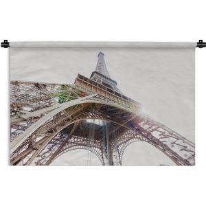 Wandkleed Eiffeltoren - De Eiffeltoren met een zonnestraal door het ijzeren geraamte Wandkleed katoen 90x60 cm - Wandtapijt met foto