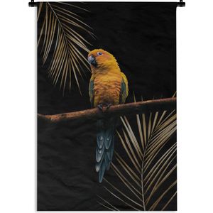 Wandkleed VogelKerst illustraties - Kleurrijke vogel op een zwarte achtergrond met palmtakken Wandkleed katoen 60x90 cm - Wandtapijt met foto