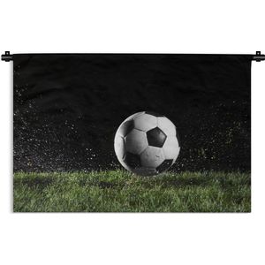 Wandkleed Voetbal - Voetbal in het gras Wandkleed katoen 120x80 cm - Wandtapijt met foto