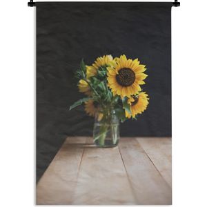 Wandkleed Zonnebloemen - Boeket zonnebloemen op een houten tafel Wandkleed katoen 90x135 cm - Wandtapijt met foto