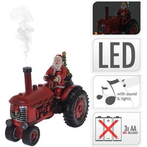 Kerstman op tractor met licht 28cm - Met geluid - Met echte rook