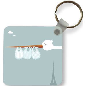 Sleutelhanger - Uitdeelcadeautjes - Illustratie van een ooievaar met slabbetjes - Plastic