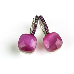 Zilveren oorringen oorbellen model pomellato gezet met fel roze steen