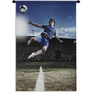 Wandkleed Voetbal - Voetballer doet een volley Wandkleed katoen 60x90 cm - Wandtapijt met foto