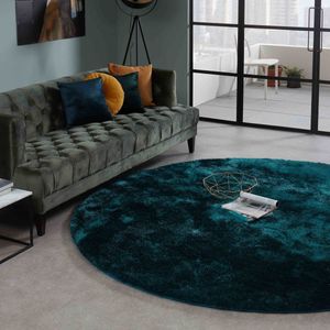 Rond vloerkleed in petrol kleursamenstelling