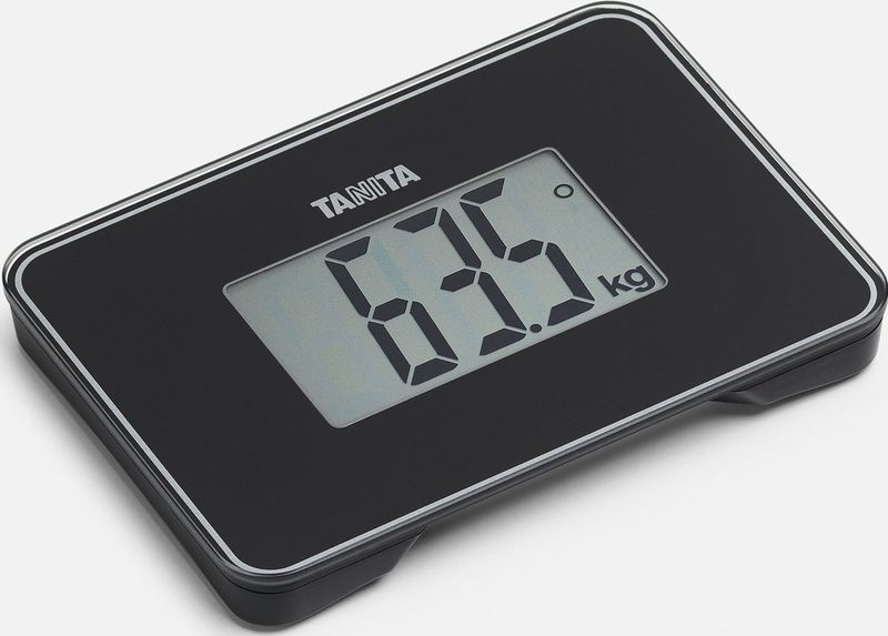 TANITA HD-386 - 's Werelds Kleinste Personenweegschaal - Mini Weegschaal 19x13,5x2cm - tot 150 kg - Ideaal voor Reizen en Kleine Ruimtes - Zwart