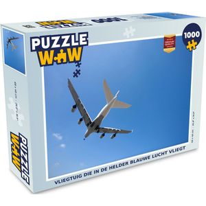 Puzzel Vliegtuig die in de helder blauwe lucht vliegt - Legpuzzel - Puzzel 1000 stukjes volwassenen