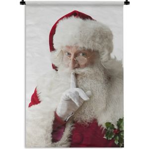 Wandkleed Kerst - De kerstman met de vinger op zijn mond Wandkleed katoen 60x90 cm - Wandtapijt met foto