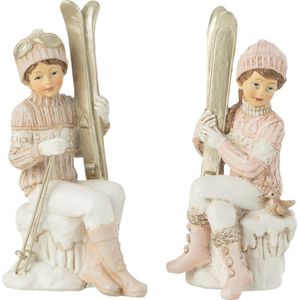 J-Line Kerstfiguren meisje & jongen - ski zittend - polyresin - wit roze - 2 stuks - kerstversiering