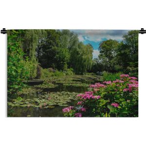 Wandkleed Monet's tuin - Zomerdag met waterlelies in het water in Monet's tuin in Frankrijk Wandkleed katoen 150x100 cm - Wandtapijt met foto