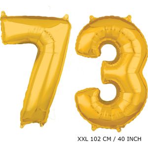 Mega grote XXL gouden folie ballon cijfer 73 jaar. Leeftijd verjaardag 73 jaar. 102 cm 40 inch. Met rietje om ballonnen mee op te blazen.