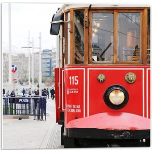 WallClassics - PVC Schuimplaat- Rode Tram door de Stad - 50x50 cm Foto op PVC Schuimplaat